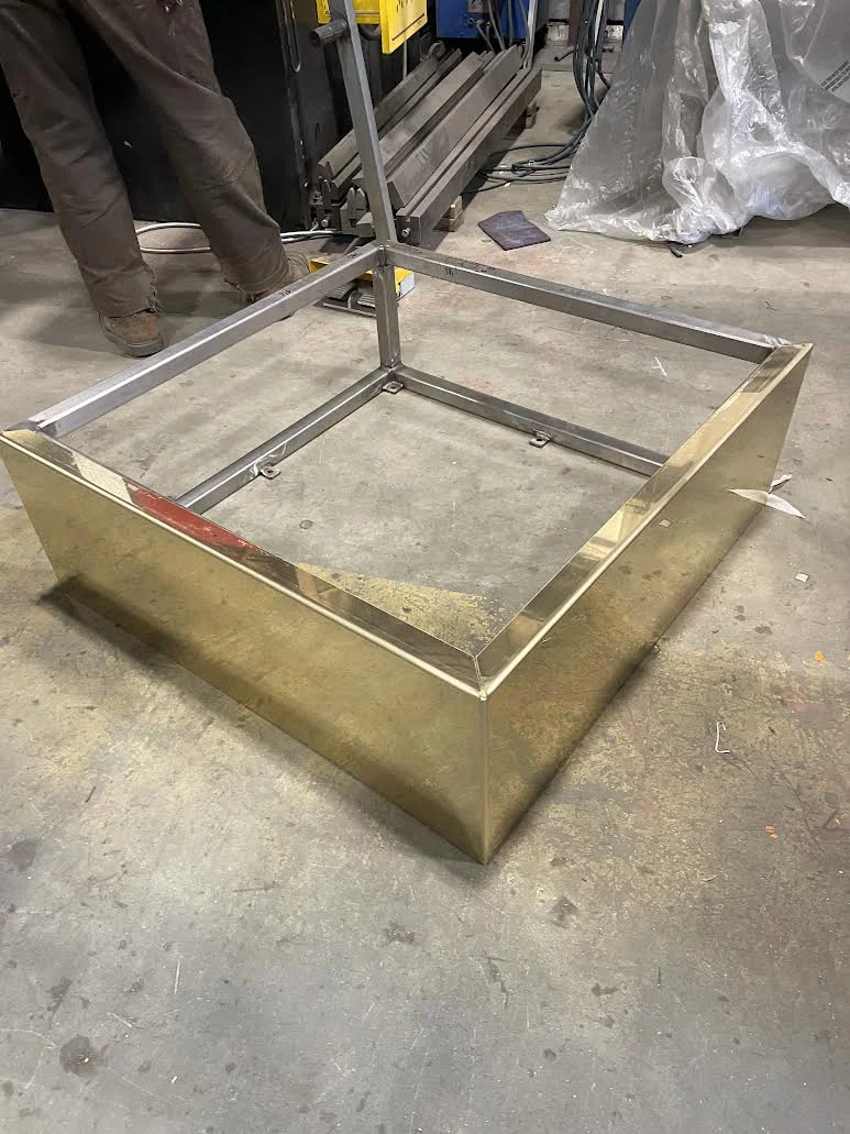 Custom fabricated steel mounting plate