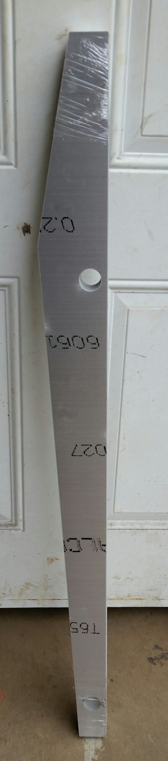 Water jet cut parts on work table