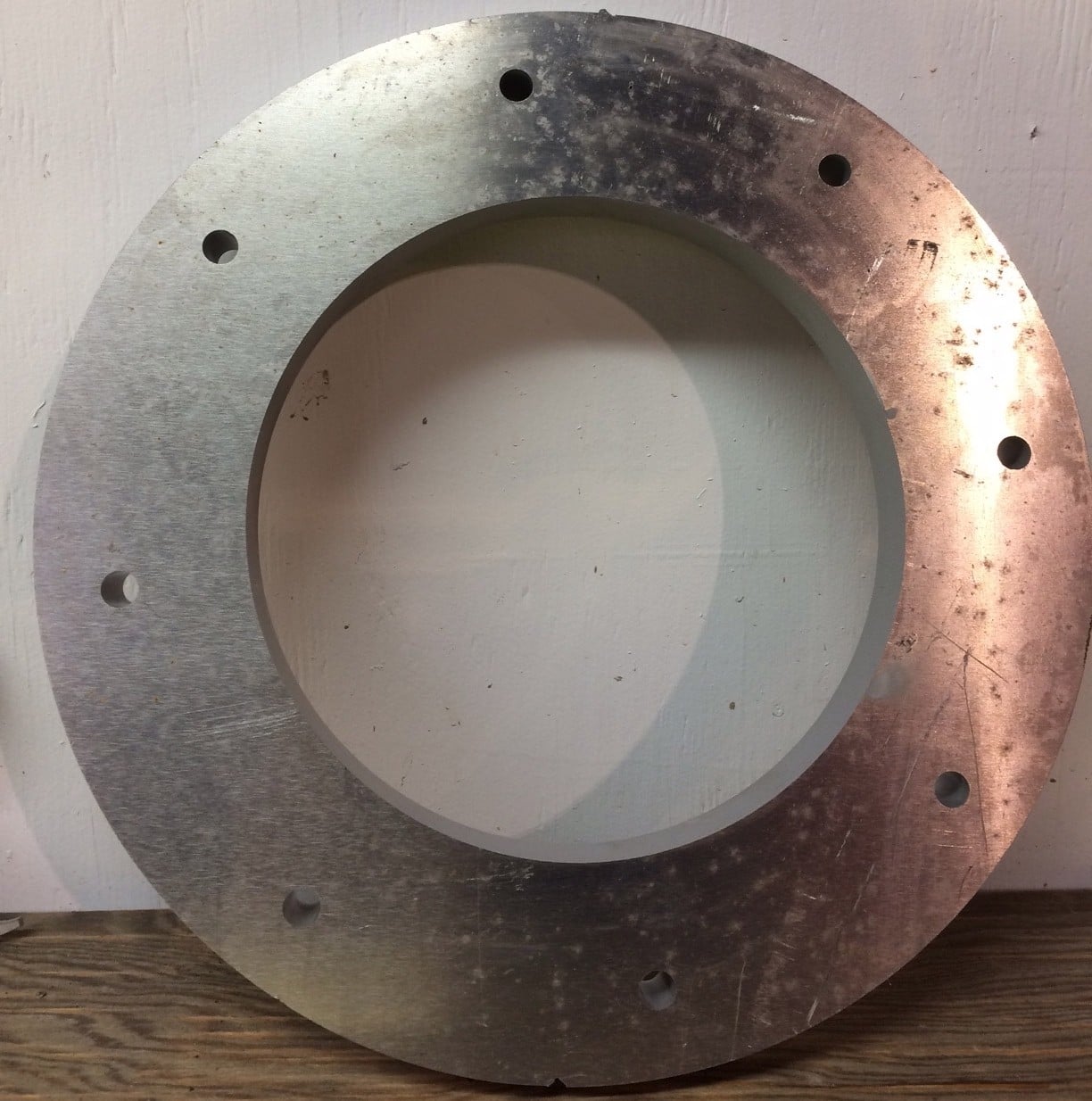 Water jet cut aluminum flange