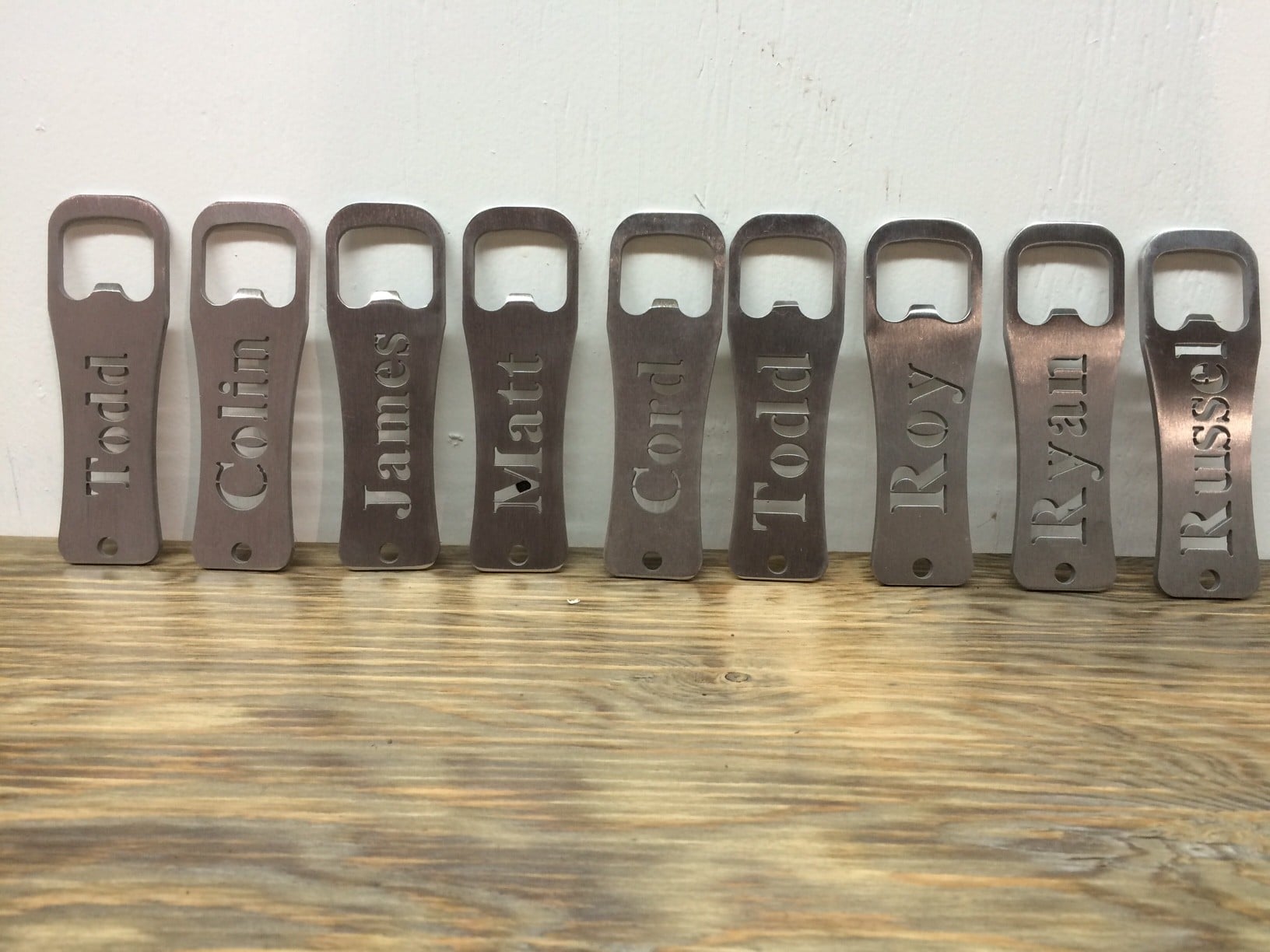 Custom water jet cut bottle openers
